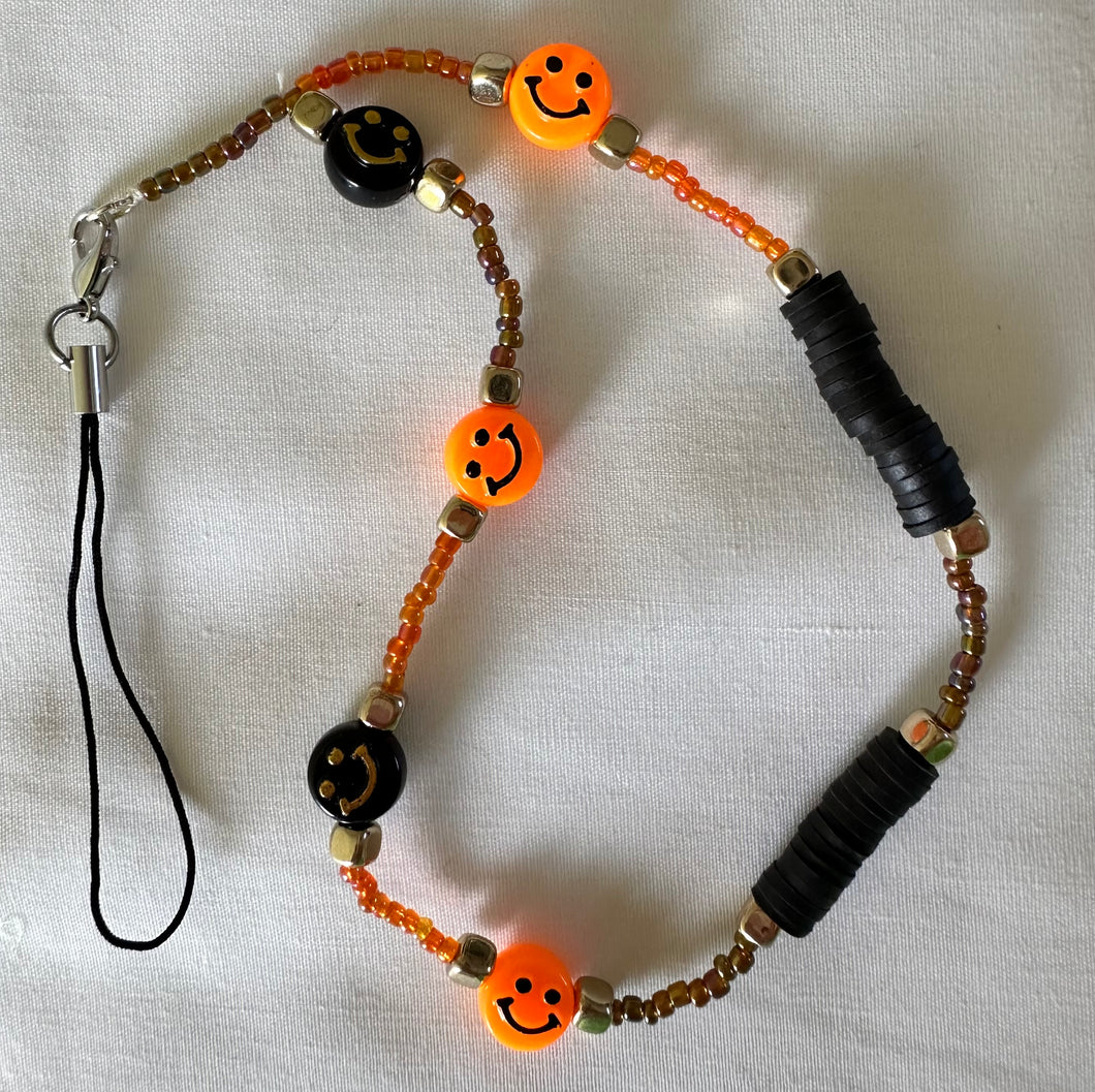 Phone Charm Orange & Black Smiley Faces